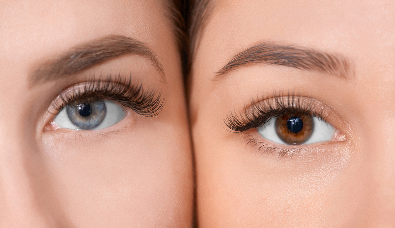 Why are blue eyes more sensitive to light compared to brown eyes?