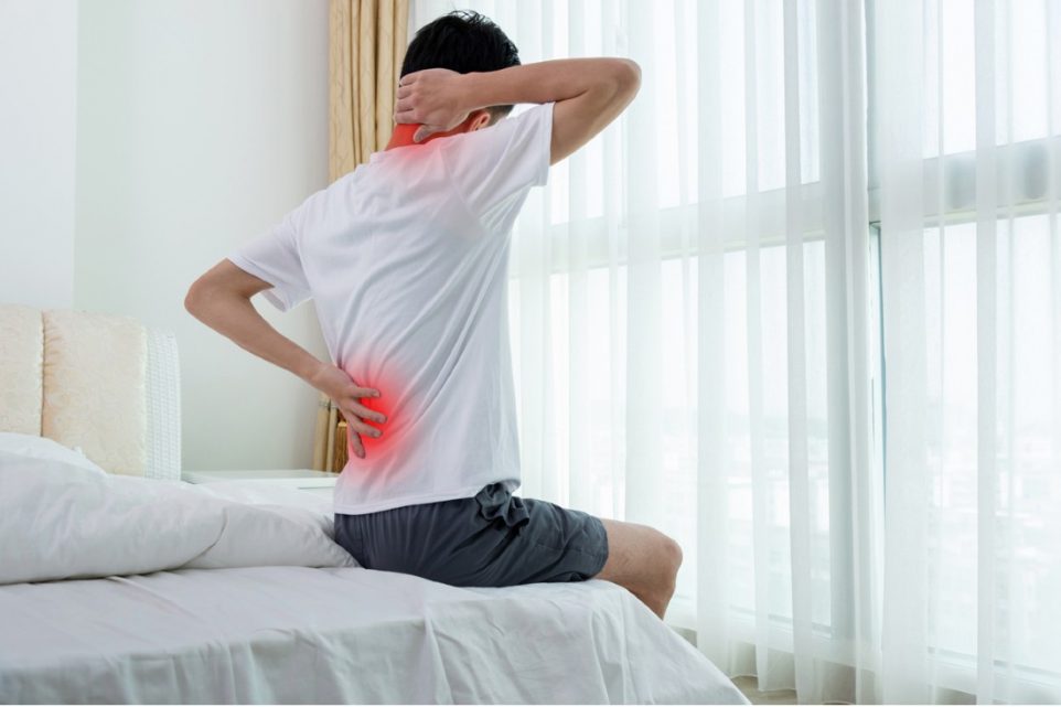 how can stiff and tight muscles result in back pain